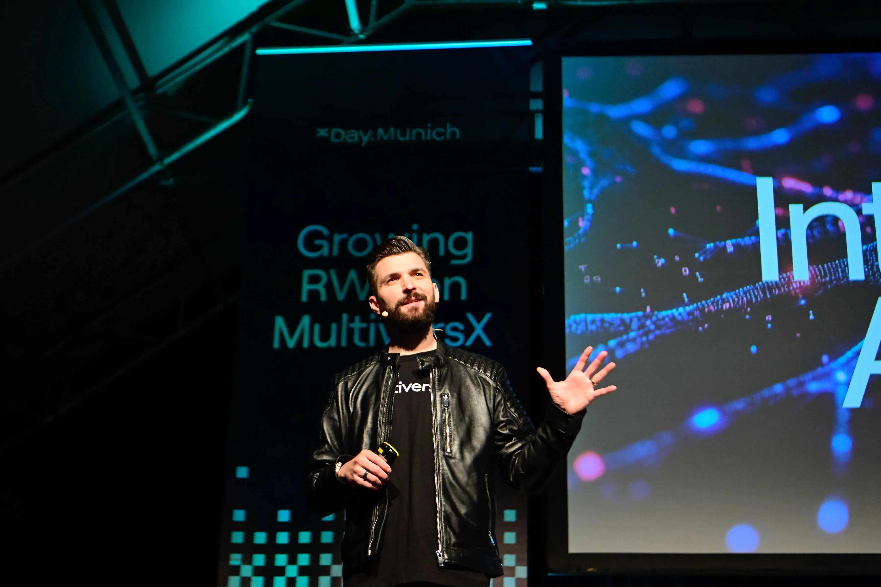 Beniamin Mincu on stage at xDay Munich, in the iconic jacket.